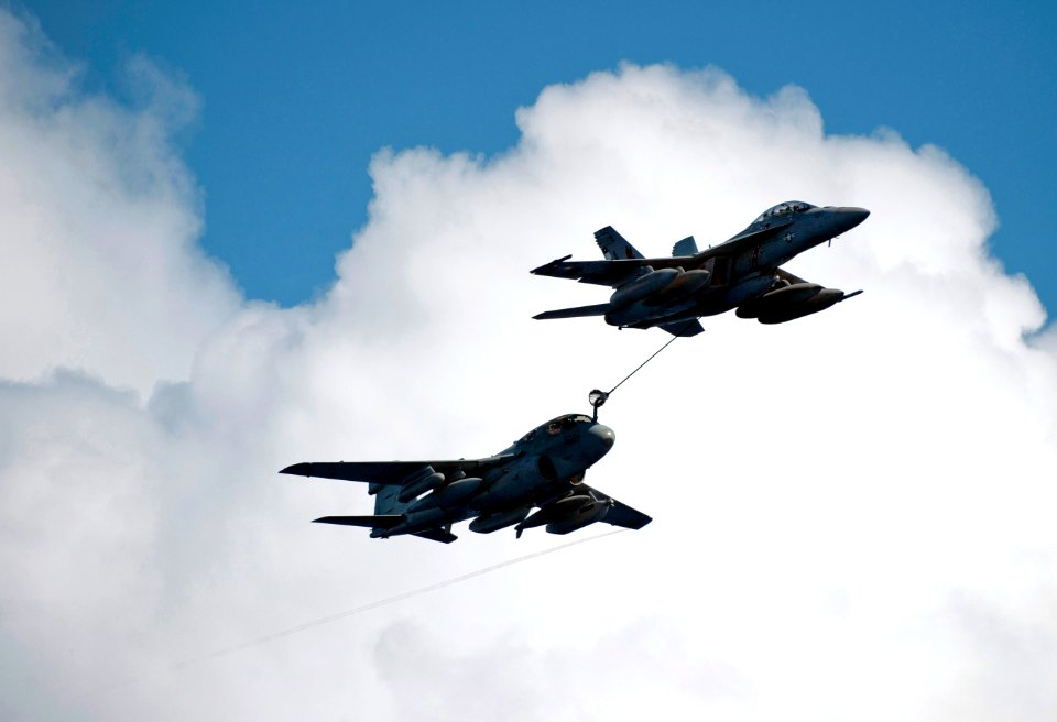 US Navy 110531-N-DR144-652 An F-A-18F Super Hornet assigned to Strike Fighter Squadron (VFA) 22 refuels an EA-6B Prowler assigned to Electronic Att