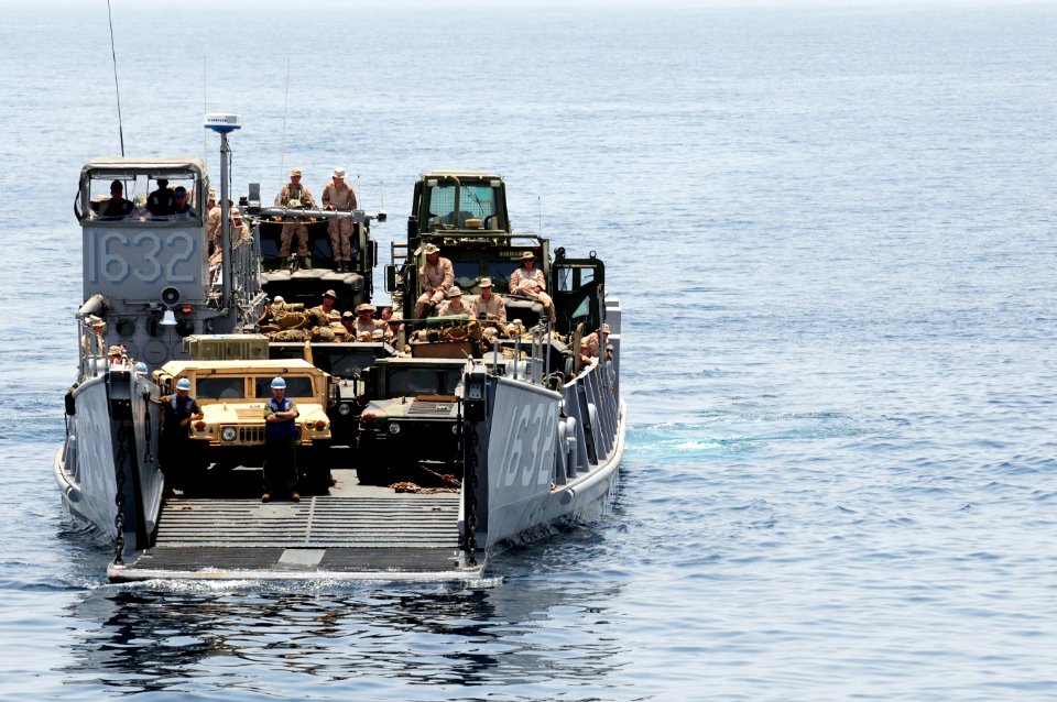 US Navy 110601-N-RC734-197 Landing Craft Utility (LCU) 1632 approaches the well deck during stern gate marriage operations aboard USS Comstock (LSD
