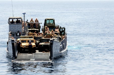 US Navy 110601-N-RC734-197 Landing Craft Utility (LCU) 1632 approaches the well deck during stern gate marriage operations aboard USS Comstock (LSD