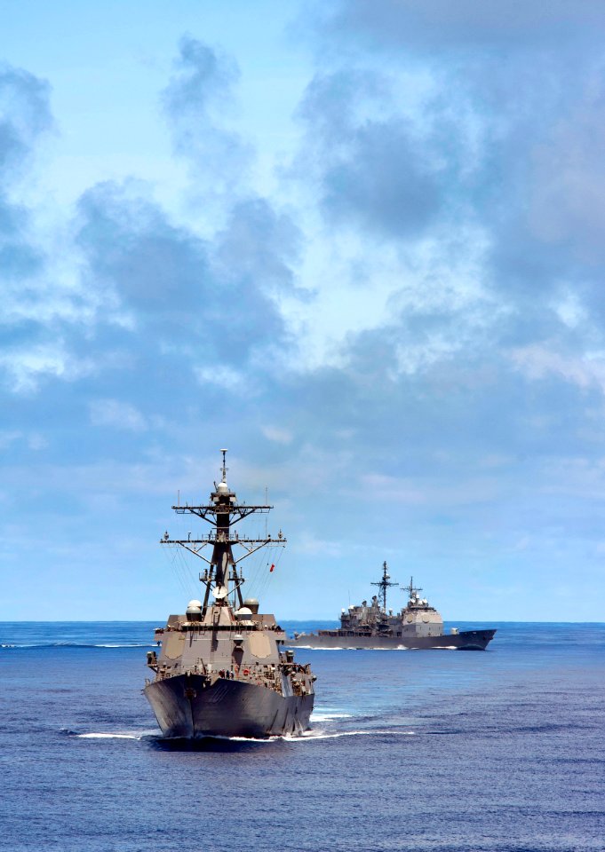 US Navy 110529-N-DR144-753 USS Gridley and USS Bunker Hill approach USS Carl Vinson during a refueling at sea