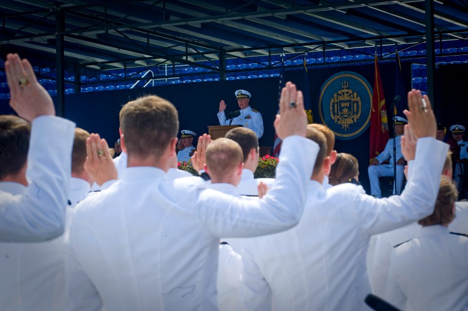 US Navy 110527-N-ZB612-109 Chief of Naval Operations (CNO) Adm. Gary Roughead administers the oath of office during the U.S. Naval Academy Class of