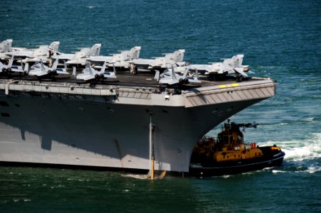 US Navy 110531-N-VQ827-714 Sailors aboard the aircraft carrier USS George H.W. Bush (CVN 77) use a fire hose to wash the anchor as the ship pulls o
