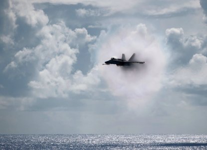 US Navy 110531-N-DR144-595 An F-A-18C Hornet assigned to Strike Fighter Squadron (VFA) 113 breaks the sound barrier over the Nimitz-class aircraft