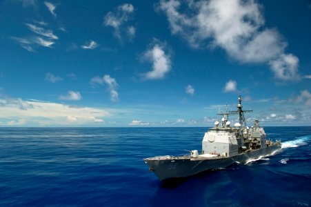 US Navy 110529-N-DR144-513 The Ticonderoga-class guided-missile cruiser USS Bunker Hill (CG 52) approaches the Nimitz-class aircraft carrier USS Ca