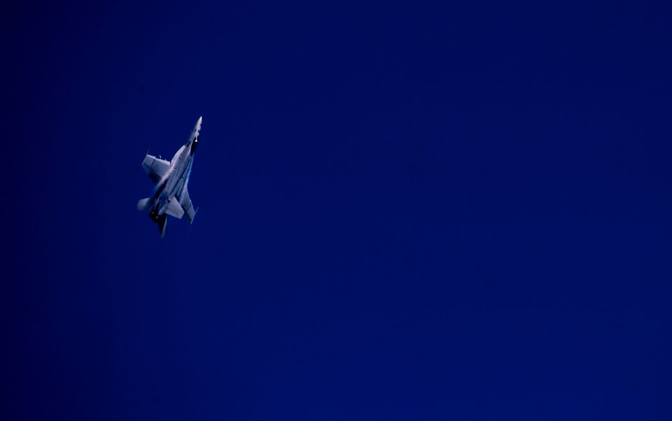 US Navy 110603-N-TU221-335 An F-A-18E Super Hornet maneuvers during an air power demonstration over USS Carl Vinson (CVN 70)