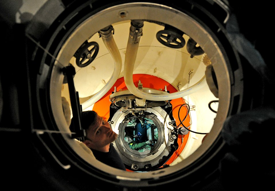 US Navy 110530-N-EC642-232 Navy Diver 1st Class Joshua Roy prepares to greet crew members of the Turish navy submarine SSK Anafartalar during an un