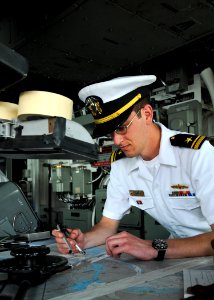 US Navy 110602-N-YM590-007 Lt. j.g. John D. Camp charts the ship's course aboard USS Anzio (CG 68) as they pull out of Varna, Bulgaria