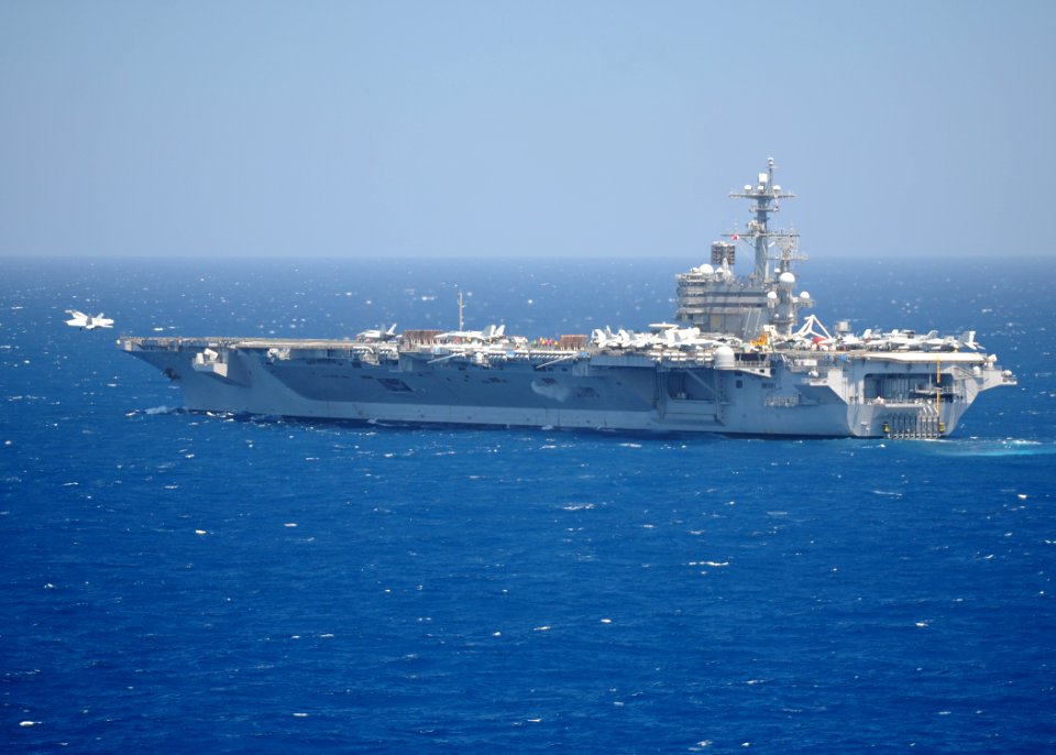 US Navy 110602-N-YZ751-554 An F-A-18 Hornet takes off from USS George H.W. Bush (CVN 77)