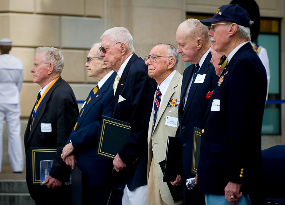 US Navy 110603-N-ZB612-166 Battle of Midway veterans are congratulated with a standing ovation during a Battle of Midway commemoration ceremony