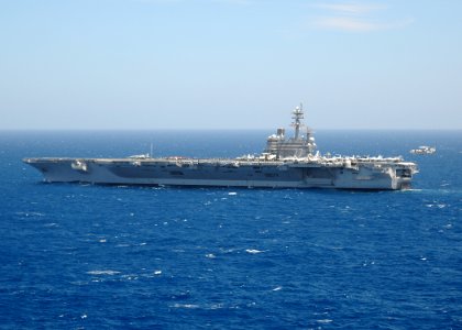 US Navy 110602-N-YZ751-639 An E-2C Hawkeye lands aboard USS George H.W. Bush (CVN 77)
