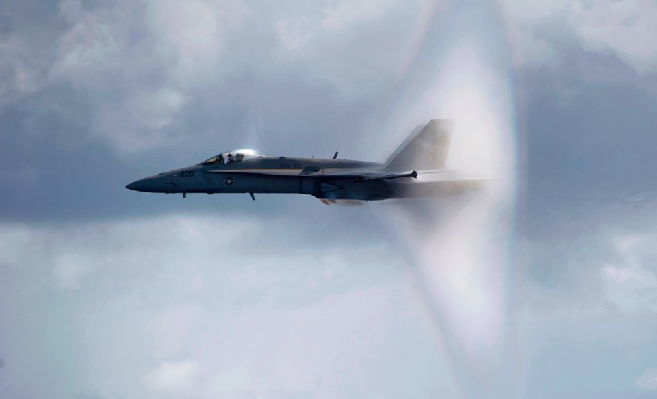US Navy 110531-N-DR144-605 An F-A-18C Hornet assigned to Strike Fighter Squadron (VFA) 113 breaks the sound barrier over the Nimitz-class aircraft