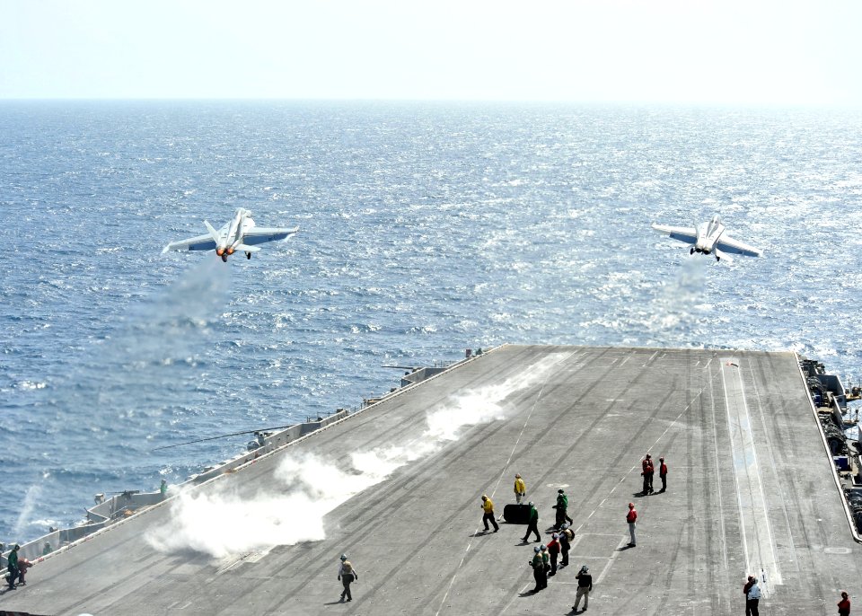 US Navy 110531-N-CH661-193 Two F-A-18F Super Hornets assigned to the Checkmates of Strike Fighter Squadron (VFA) 211 launch from the aircraft carri
