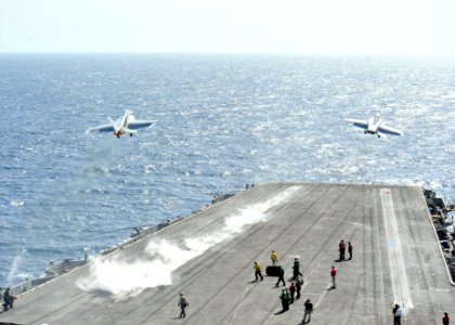 US Navy 110531-N-CH661-193 Two F-A-18F Super Hornets assigned to the Checkmates of Strike Fighter Squadron (VFA) 211 launch from the aircraft carri