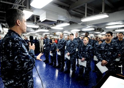 US Navy 110604-N-EC658-080 Capt. Stephen Koehler, commanding officer of the multipurpose amphibious assault ship USS Bataan (LHD 5), addresses newl