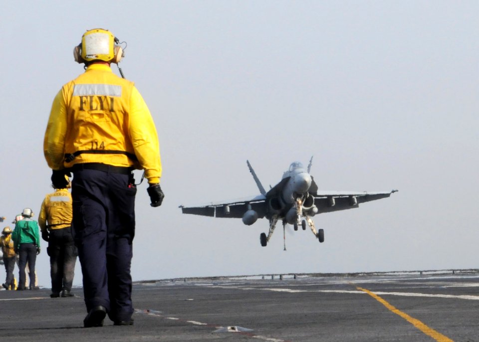 US Navy 110531-N-SG869-533 An F-A-18C Hornet assigned to the Blue Diamonds of Strike Fighter Squadron (VFA) 146 lands aboard the aircraft carrier U