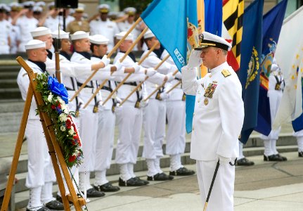 US Navy 110603-N-ZB612-070 Chief of Naval Operations (CNO) Adm. Gary Roughead participates in a wreath laying ceremony during a Battle of Midway co