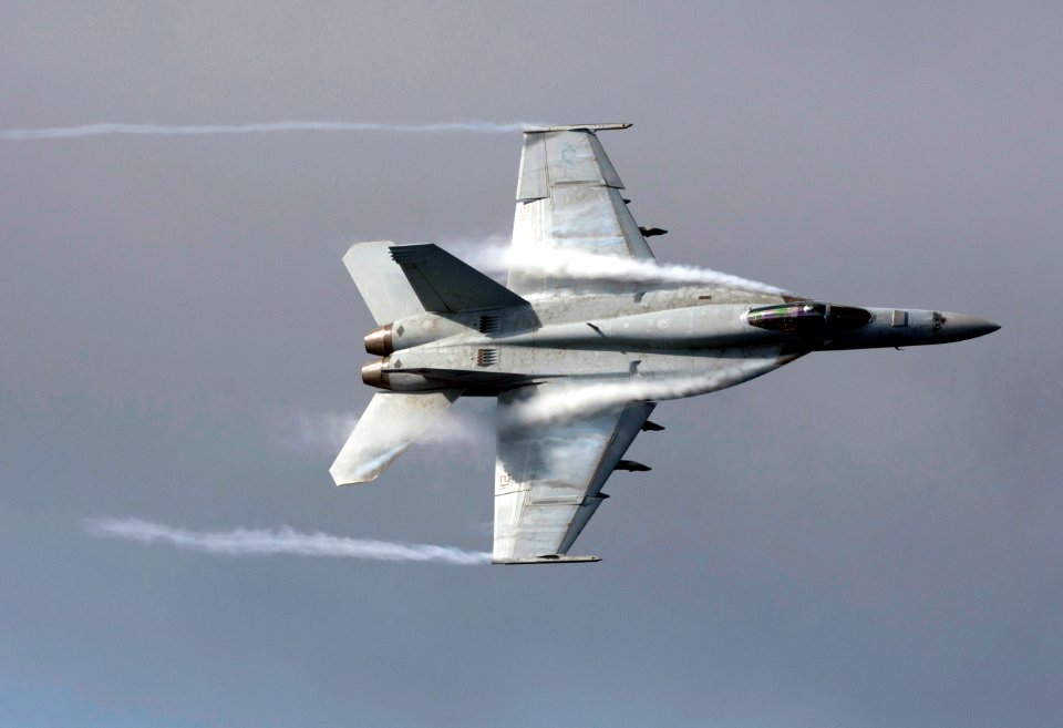 US Navy 110606-N-DR144-350 An F-A-18E Super Hornet assigned to Strike Fighter Squadron (VFA) 81 maneuvers over the Nimitz-class aircraft carrier US