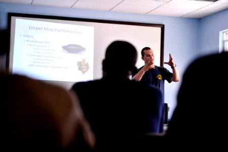 US Navy 110606-N-KB666-245 Navy Diver 2nd Class Zach Dojaquez, assigned to Mobile Dive and Salvage Unit (MDSU) 2, gives a lecture to foreign divers