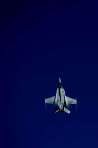 US Navy 110603-N-TU221-329 An F-A-18E Super Hornet maneuvers over USS Carl Vinson (CVN 70) during an air power demonstration