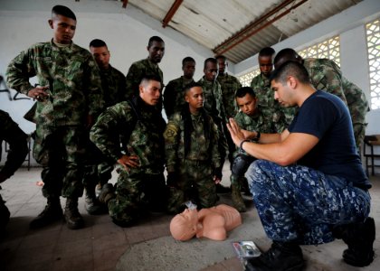US Navy 110606-N-NY820-074 Hospital Corpsman 2nd Class Antonio Carranza, from Santa Ana, Calif., conducts a subject matter expert exchange on CPR p photo