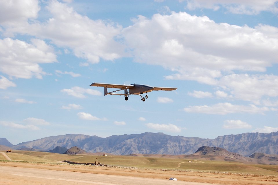 US Navy 110604-O-GR159-001 A Tiger Shark unmanned aerial vehicle returns from a mission supporting forces in theater