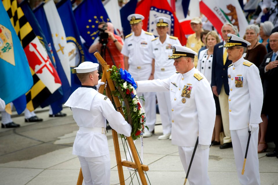 US Navy 110603-N-ZB612-061 Chief of Naval Operations (CNO) Adm. Gary Roughead participates in a wreath laying ceremony during a Battle of Midway co