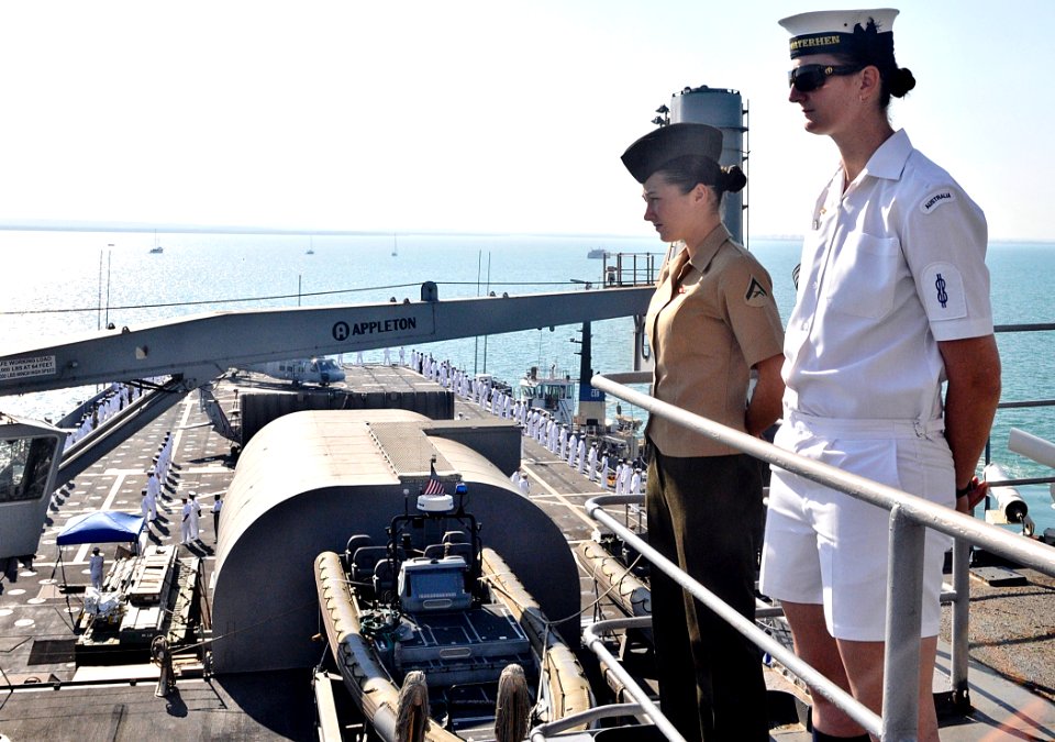 US Navy 110607-O-ZZ999-005 U.S. Sailors and Marines and service members from other countries man the rails as the amphibious transport dock ship US