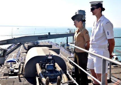 US Navy 110607-O-ZZ999-005 U.S. Sailors and Marines and service members from other countries man the rails as the amphibious transport dock ship US