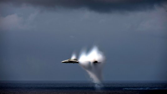 US Navy 110606-N-TU221-413 An F-A-18C Hornet assigned to Strike Fighter Squadron (VFA) 113 breaks the sound barrier during an air power demonstrati