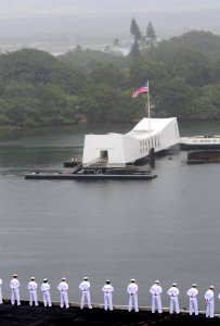 US Navy 110607-N-OK922-535 Sailors render honors to the USS Arizona Memorial as the ship arrives in Pearl Harbor