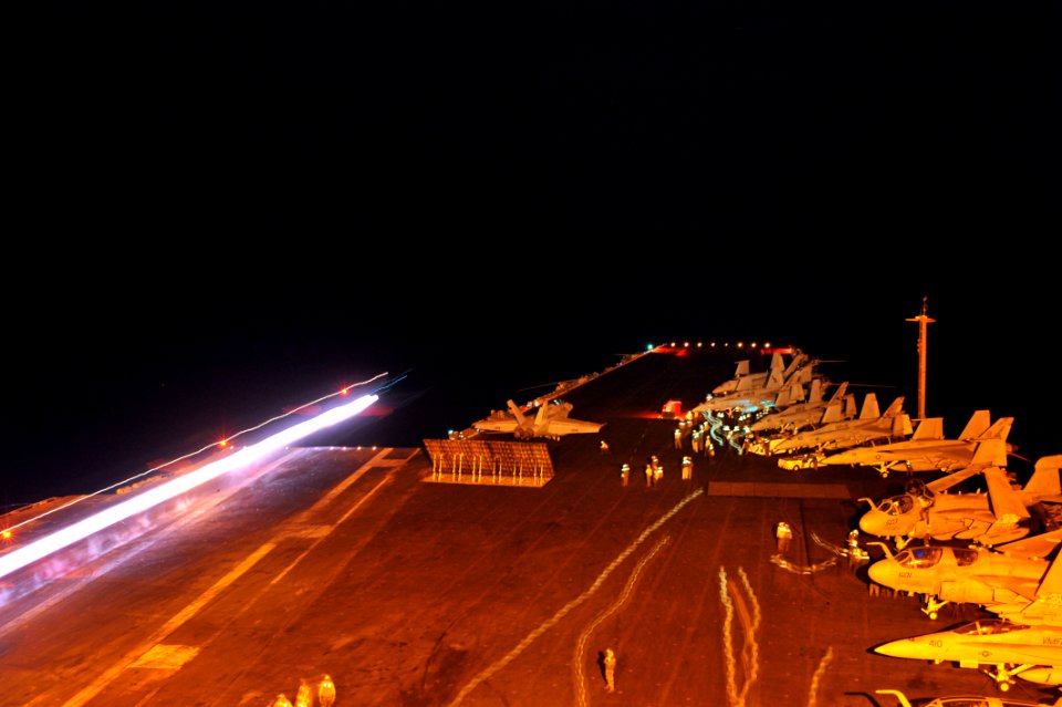 US Navy 110605-N-CH661-003 n F-A-18F Super Hornet assigned to the Red Rippers of Strike Fighter Squadron (VFA) 11 is ready for launch on catapult t
