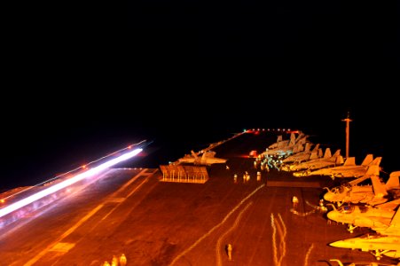 US Navy 110605-N-CH661-003 n F-A-18F Super Hornet assigned to the Red Rippers of Strike Fighter Squadron (VFA) 11 is ready for launch on catapult t
