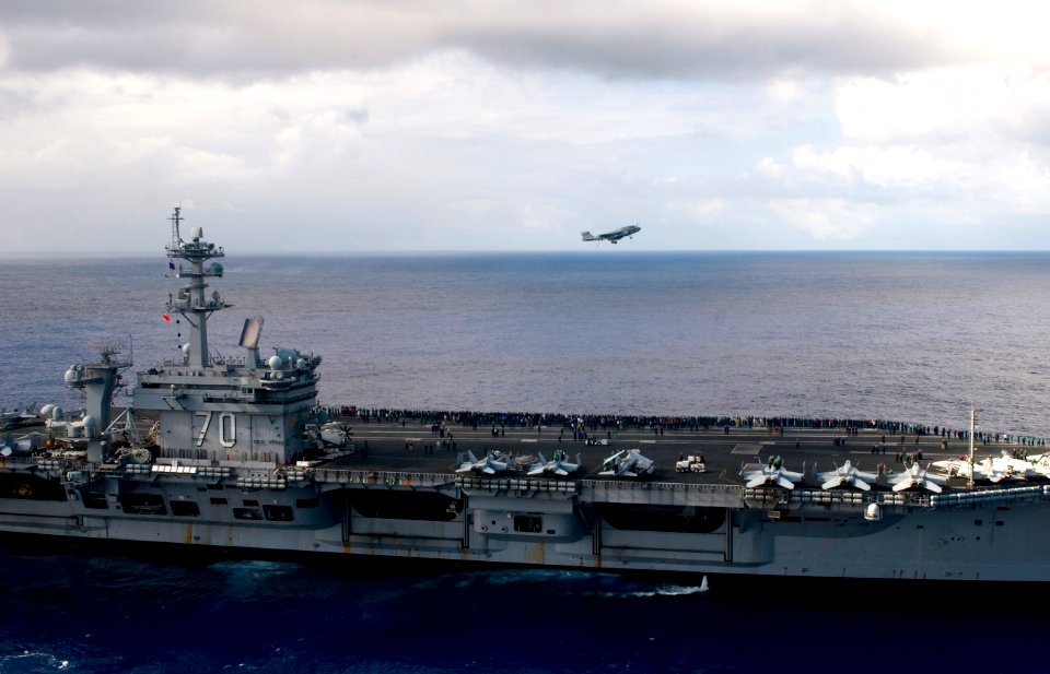 US Navy 110606-N-GZ277-038 An EA-6B Prowler assigned to Electronic Attack Squadron (VAQ) 134 flies over the Nimitz-class aircraft carrier USS Carl