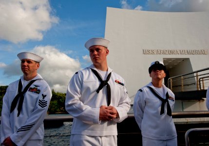 US Navy 110609-N-DR144-186 Aviation Machinist's Mate 1st Class Jason C. Evans, left, Aviation Ordnanceman 3rd Class John C. Anthony, and Informatio