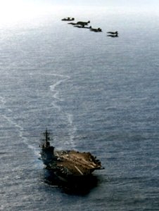 US Navy 110606-N-GZ277-259 A formation of aircraft assigned to Carrier Air Wing (CVW) 17 fly over Nimitz-class aircraft carrier USS Carl Vinson (CV