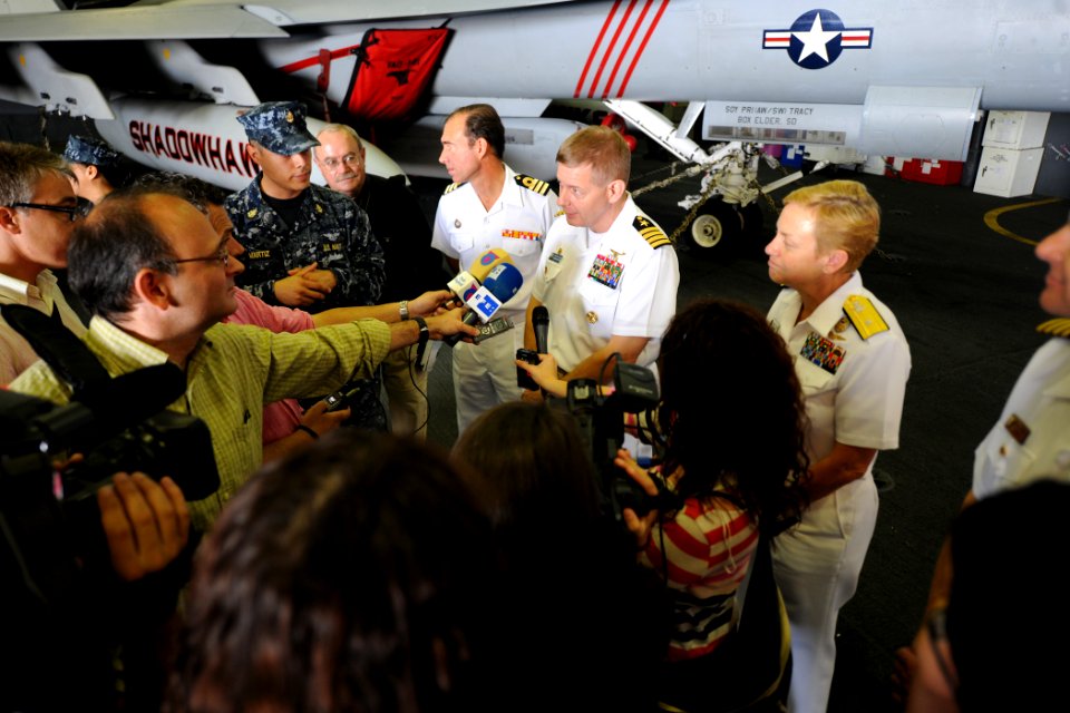 US Navy 110607-N-YZ751-021 Capt. Brian E. Luther, commanding officer of the aircraft carrier USS George H.W. Bush (CVN 77), answers questions from