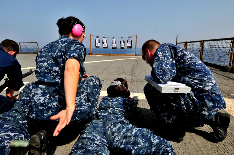 US Navy 110608-N-AG285-213 Sailors hold an M-16 service rifle qualification aboard the amphibious dock landing ship USS Whidbey Island (LSD 41)