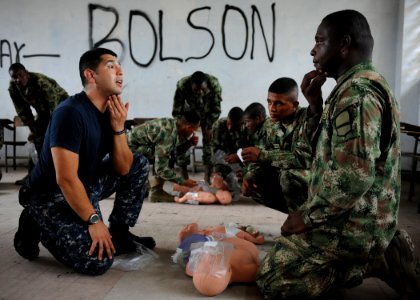 US Navy 110606-N-NY820-130 Hospital Corpsman 2nd Class Antonio Carranza, from Santa Ana, Calif., conducts a subject matter expert exchange on CPR p
