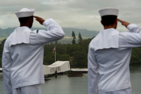US Navy 110607-N-DR144-711 Sailors aboard USS Carl Vinson (CVN 70) render honors to the USS Arizona Memorial as the ship arrives in Pearl Harbor
