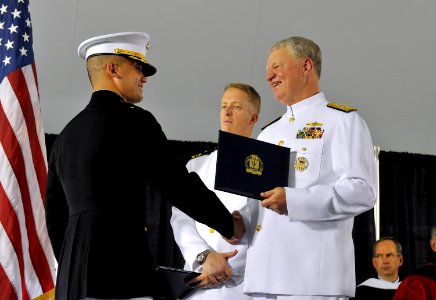 US Navy 110610-N-ZB612-276 Chief of Naval Operations (CNO) Adm. Gary Roughead presents degrees to service members during the U.S. Naval War College