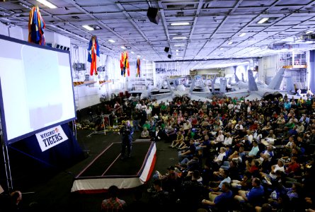 US Navy 110611-N-GZ277-322 Rear. Adm. Samuel Perez, commander of Carrier Strike Group (CSG) 1, welcomes Sailors, friends and family to the Nimitz-c