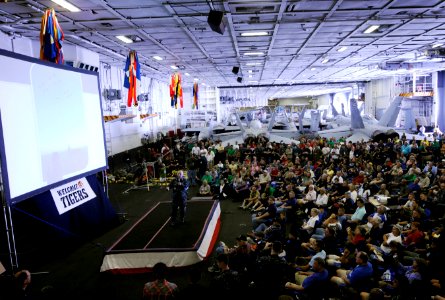 US Navy 110611-N-GZ277-322 Rear. Adm. Samuel Perez, commander of Carrier Strike Group (CSG) 1, welcomes Sailors, friends and family to the Nimitz-c photo