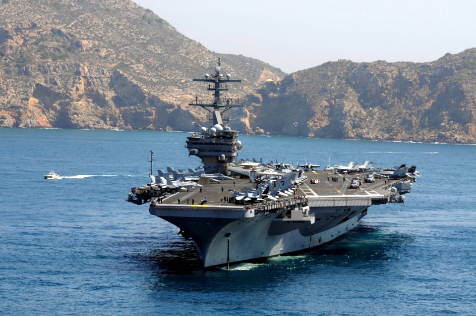 US Navy 110609-N-QL471-142 The aircraft carrier USS George H.W. Bush (CVN 77) departs Cartagena, Spain, after completing its second liberty port vi