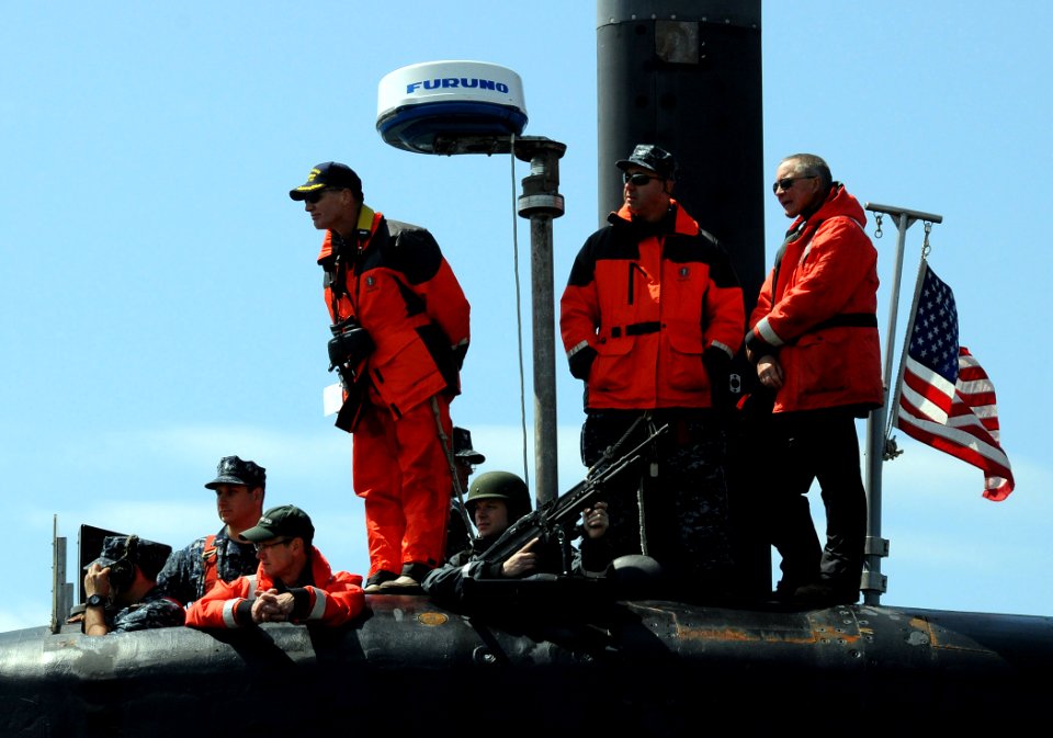 US Navy 110608-N-GU530-230 Capt. Jerry Logan, left, commanding officer of the Blue Crew of the Ohio-class guided-missile submarine USS Michigan (SS