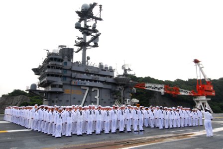 US Navy 110612-N-AW206-007 Sailors assigned to the aircraft carrier USS George Washington (CVN 73) and Carrier Air Wing (CVW) 5 stand in formation