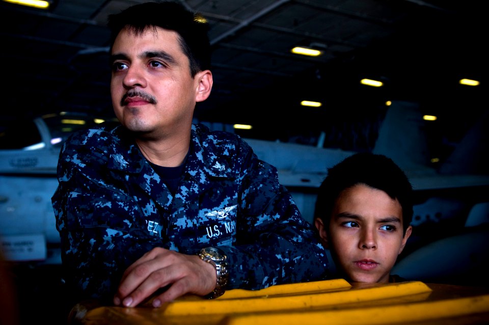 US Navy 110610-N-MD252-354 Aviation Electronics Technician 2nd Class Martin Perez, assigned to Strike Fighter Squadron (VFA) 25, and his sponsored