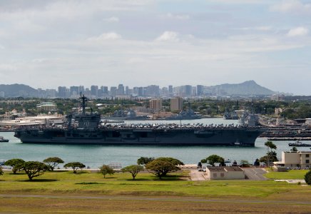 US Navy 110610-N-DR144-846 The Nimitz-class aircraft carrier USS Carl Vinson (CVN 70) departs Joint Base Pearl Harbor-Hickam with Sailors' friends