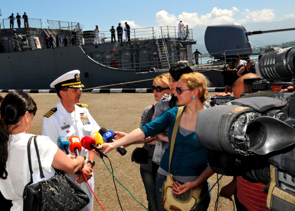 US Navy 110609-N-YM590-140 Capt. John M. Dorey speaks to media during a press brief on the pier after USS Anzio (CG 68) pulled into Batumi, Georgia