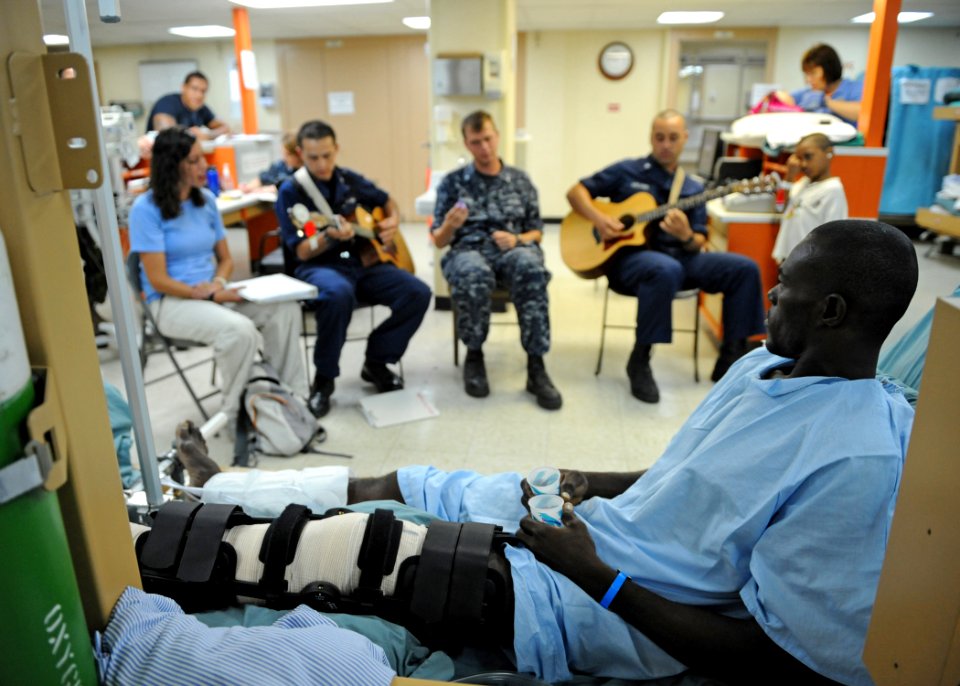 US Navy 110610-N-NY820-215 U.S. Fleet Forces Band members and Latter Day Saints Charities volunteers play music for Patients aboard the Military Se