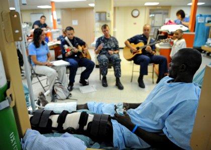 US Navy 110610-N-NY820-215 U.S. Fleet Forces Band members and Latter Day Saints Charities volunteers play music for Patients aboard the Military Se